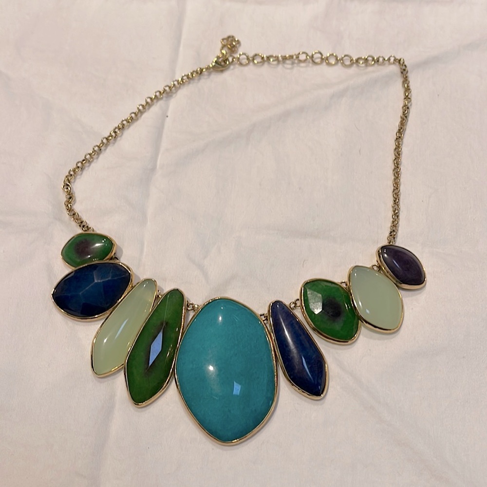 Thirty one blue and gold stone necklace